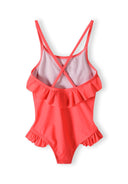Girls one-piece swimsuit in coral, back view with ruffled detail.