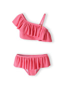 Girls two-piece pink bikini set with ruffle detail, front view.