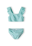 Girls two-piece mint bikini with ruffled straps, front view.