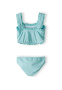 Girls 2 piece bikini in blue, front view, features ruffled straps and matching bottoms.