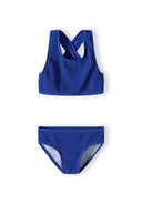 Girls cobalt blue bikini two-piece set, front view, featuring a cross-back top and regular cut bottoms.