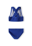 Girls two-piece bikini in cobalt blue, back view, featuring adjustable straps and regular cut bottoms.
