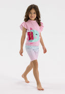 Girls light pink short sleeve rash top with ruffle sleeves and matching swim shorts, detail view.