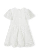 Girls white flare sleeve dress with lace detail, back view.