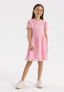 Girls pink lace dress with flared sleeves and circle skirt, front view.