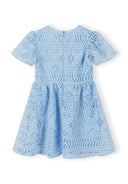 Girls dress with flared sleeves and circle skirt in blue lace, back view.