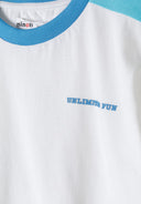 Close-up of a boys' short sleeve t-shirt in white with blue neckline and 'UNLIMITED FUN' print.