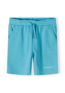 Front view of boys' fleece shorts in blue with elastic waistband and 'UNLIMITED FUN' print.