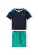 Boys short sleeve t-shirt and fleece shorts set, navy and green, top view, features chest print and adjustable waistband.
