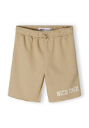 Beige shorts with elastic waistband and printed text detail, front view.