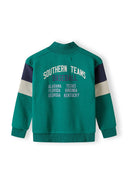 Boys green jumper with half zip, featuring printed text and contrasting sleeve panels.