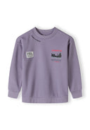 Boys oversized lilac crew neck sweatshirt with graphic print, front view.
