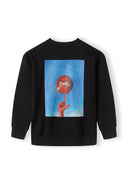 Boys black sweatshirt, back view, featuring a graphic print of a hand holding a basketball.