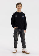 Boys black sweatshirt with graphic print, front view, featuring ribbed cuffs and hem.