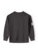 Boys grey fleece crew neck sweatshirt, back view with ribbed cuffs and sleeve patch.