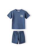 Boys short sleeve t-shirt and shorts set in blue, featuring a tennis motif on the chest and back, with side pockets.