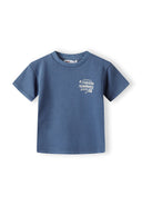 Boys short sleeve t-shirt in blue with tennis motif on chest, front view.