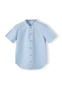 Boys grandad-style shirt in light blue with button front and stand-up collar.