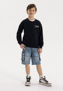 Boys denim cargo shorts, front view, featuring large cargo pockets and drawcord waistband.