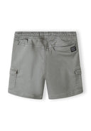 Back view of boys' grey knitted cargo shorts with large side pockets.