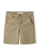 Boys beige woven chino shorts, front view, featuring two side pockets and adjustable waistband.
