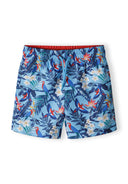 Boys swim board shorts, blue with tropical print, front view, elastic waistband with drawstrings.