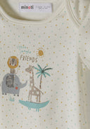 Close-up of cream bodysuit with colorful jungle animal friends design and polka dot pattern for babies.