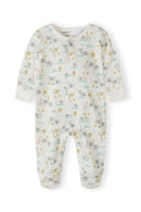 Cream-colored baby sleepsuit with playful animal and nature design in soft pastel tones