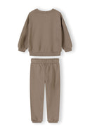 Back view of a beige boys tracksuit sweatshirt and joggers with elastic cuffs and waistband, showcasing a simple design.