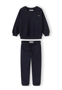 Navy blue boys tracksuit set with sweatshirt and joggers, featuring adjustable waist and minimalist design.