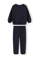 Navy blue boys tracksuit with sweatshirt and joggers featuring an adjustable waist and soft cotton design.