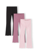 Set of three girls ribbed flare leggings in pink, purple, and black with elasticated waistband, featuring a unique scalloped hem design.