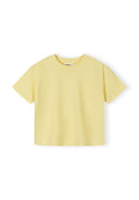 Simple pastel yellow cotton t-shirt with crew neck and short sleeves for girls, featuring a clean and comfortable design.