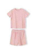 Detail view of pink ribbed fabric texture showing delicate floral print pattern and elastic waistband