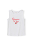 White ribbed sleeveless tank top with pink 'Pyjamas all day' text and heart graphic, displayed flat against white background showing Minoti branding