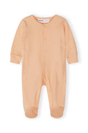 Soft peach long-sleeve baby sleepsuit with footies and simple design for newborns to 24 months.