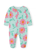 Baby sleepsuit in pastel blue with large pink floral design and orange centers, featuring snap closures and long sleeves.