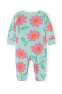 Baby sleepsuit in soft cotton featuring a playful pink floral design on a light blue background.