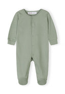 Soft green baby sleepsuit with long sleeves and snap buttons, designed for comfort and ease of use in baby fashion.