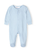 Soft light blue baby sleepsuit with long sleeves and snap buttons, designed for comfort and easy dressing.