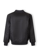 Back view of boys black nylon bomber jacket with ribbed cuffs and hem showing smooth padded design