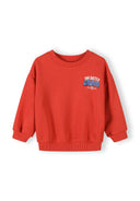 Red boys sweatshirt with urban design print in blue, featuring ribbed cuffs and neckline for kids fashion.