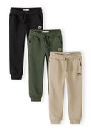 Three boys joggers in black, olive, and beige with drawstring and side pockets, featuring a sporty design.