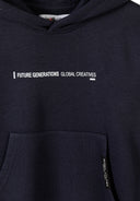 Close-up of black boys hoodie with front pocket and white printed inspirational text design.