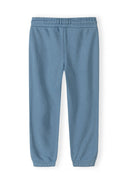 Soft blue joggers for boys with elastic waistband and cuffs, designed for comfort and everyday kids fashion.