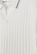 Detail of off-white knitted polo t-shirt with a collar and vertical stripes.