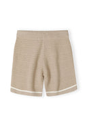 Beige shorts with elasticated waistband and white stripe detail, back view.