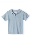 Light blue knitted polo shirt with a lapel collar and button placket, front view.