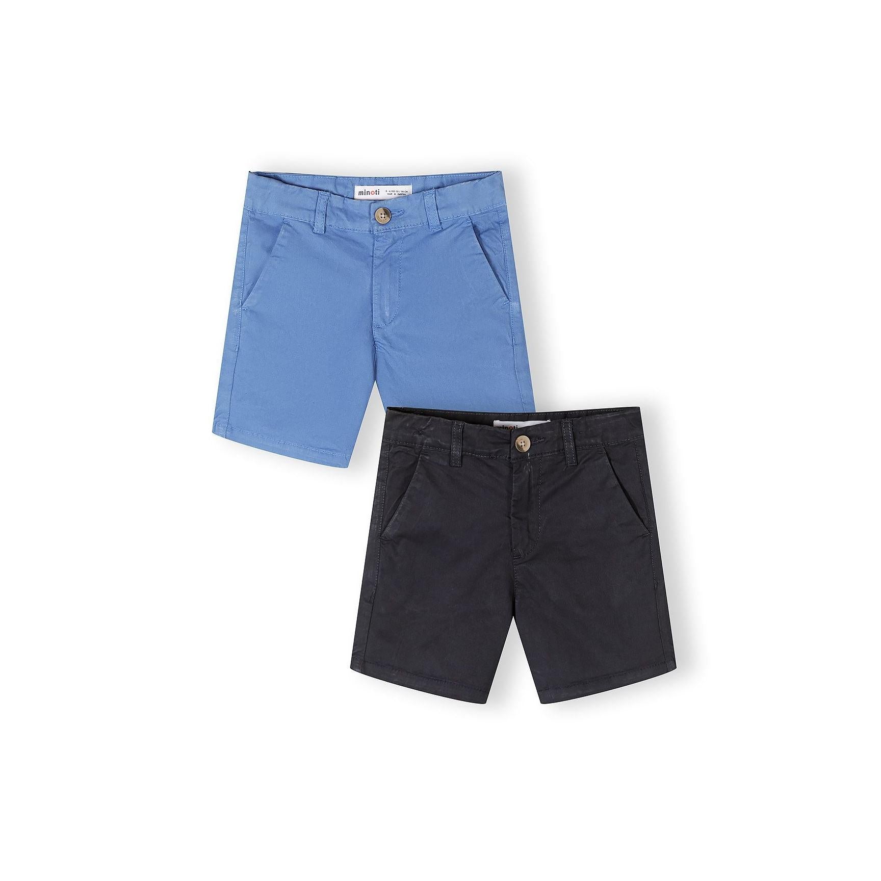 Two pairs of chino shorts laid flat on white background, one in light blue and one in navy, both featuring classic chino styling with button closure and side pockets