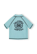 Turquoise kids rash vest with black surfer graphic design and seamless short sleeves for a streamlined fit
